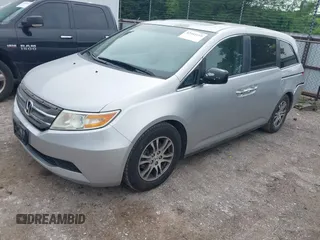 2012 Honda Odyssey EX-L with VIN 5FNRL5H66CB081323, listed as a IAAI auction lot 42465110 with 266,934 mi miles and . Bid and sale history available at DreamBid. Image 19.