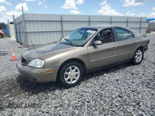 2003 Mercury Sable GS with VIN 1MEFM50U33A632888, listed as a Copart auction lot 61183765 with 210,362 mi miles and Salvage title. Bid and sale history available at DreamBid. Image 1.