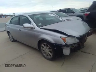 2010 Toyota Avalon XL with VIN 4T1BK3DBXAU359877, listed as a IAAI auction lot 40386607 with 141,990 mi miles and . Bid and sale history available at carsss.com. Image 1.