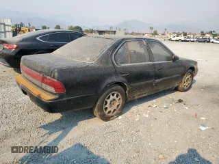 1992 Nissan Maxima z VIN JN1HJ01F1NT007180, wystawiony jako Copart lot #71271334 z przebiegiem 252 299 mil mil oraz Tytuł czysty. Historia ofert i sprzedaży dostępna na DreamBid. Obrazek 3.