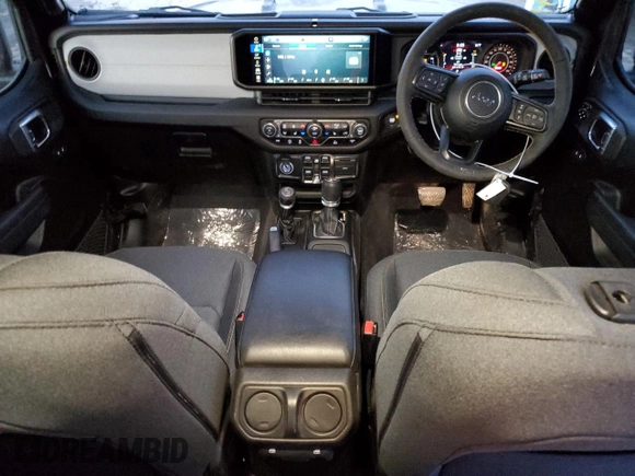 2024 Jeep Wrangler Sport с VIN 1C4PJXKN8RW291502, выставлен на аукционе Copart как лот 88326985 с пробегом 4 720 миль миль и Списание • Salvage title. История ставок и продаж доступна на DreamBid. Изображение 8.