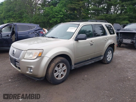2010 Mercury Mariner z VIN 4M2CN9BG2AKJ08763, wystawiony jako IAAI lot #42440952 z przebiegiem 159 599 mil mil oraz . Historia ofert i sprzedaży dostępna na DreamBid. Obrazek 2.