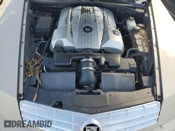 2006 Cadillac XLR z VIN 1G6YV36AX65603381, wystawiony jako Copart lot #77526894 z przebiegiem Nie podano mil oraz Nie do naprawy. Historia ofert i sprzedaży dostępna na DreamBid. Obrazek 11.