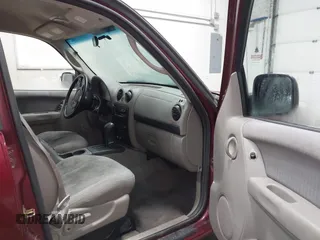 2002 Jeep Liberty Sport with VIN 1J4GL48K72W115630, listed as a IAAI auction lot 41973816 with 154,220 mi miles. Bid and sale history available at carsss.com. Image 5.