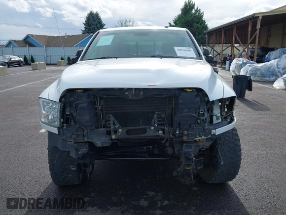 2013 Ram 2500 SLT with VIN 3C6TR5JT5DG517635, listed as a IAAI auction lot 40950960 with 99,372 mi miles and . Bid and sale history available at DreamBid. Image 13.