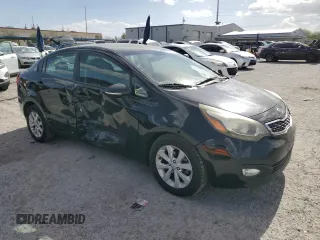 2013 Kia Rio EX with VIN KNADN4A30D6104166, listed as a Copart auction lot 56752345 with 129,708 mi miles and Salvage title. Bid and sale history available at DreamBid. Image 4.