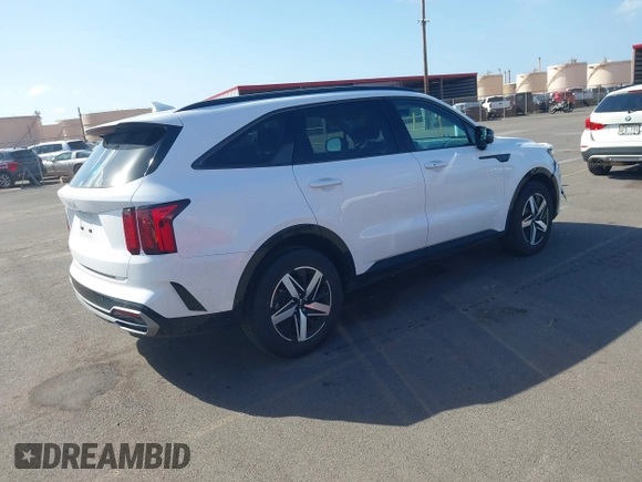 2023 Kia Sorento S with VIN 5XYRL4LC2PG235483, listed as a IAAI auction lot 41304494 with 9,660 mi miles and . Bid and sale history available at DreamBid. Image 4.