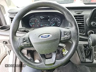 2021 Ford Transit Cargo with VIN 1FTBR1Y82MKA76523, listed as a IAAI auction lot 42679221 with 39,449 mi miles and . Bid and sale history available at DreamBid. Image 9.