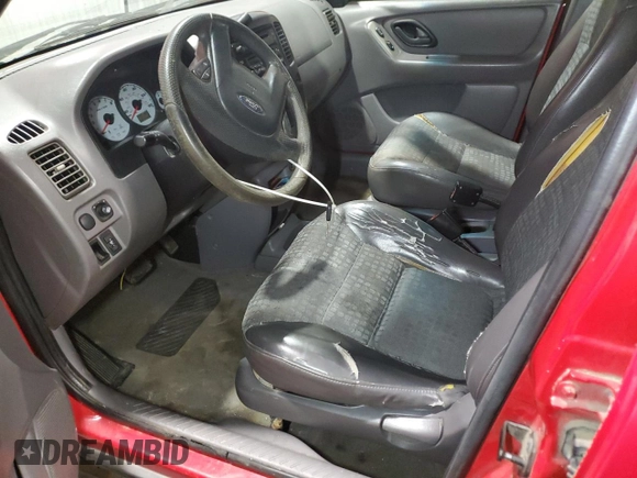 2001 Ford Escape XLS with VIN 1FMYU01181KD99269, listed as a Copart auction lot 88463335 with 217,537 mi miles and Salvage title. Bid and sale history available at DreamBid. Image 7.