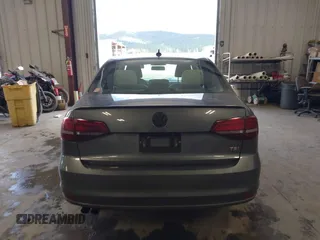2016 Volkswagen Jetta Sport z VIN 3VWD17AJ8GM410208, wystawiony jako IAAI lot #42237019 z przebiegiem 67 137 mil mil oraz . Historia ofert i sprzedaży dostępna na DreamBid. Obrazek 16.