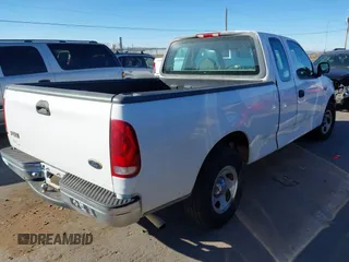 1999 Ford F-150 с VIN 1FTZX1724XKB41653, выставлен на аукционе IAAI как лот 41267645 с пробегом 114 075 миль миль и . История ставок и продаж доступна на DreamBid. Изображение 4.