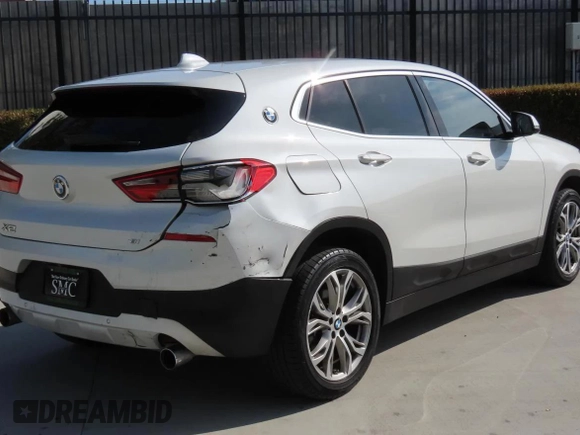2019 BMW X2 sDrive28i with VIN WBXYJ3C57KEP77485, listed as a Copart auction lot 58860995 with 80,811 mi miles and Salvage title. Bid and sale history available at DreamBid. Image 3.
