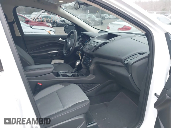 2018 Ford Escape SE z VIN 1FMCU9GD2JUC77186, wystawiony jako IAAI lot #41308133 z przebiegiem 123 156 mil mil oraz . Historia ofert i sprzedaży dostępna na DreamBid. Obrazek 5.