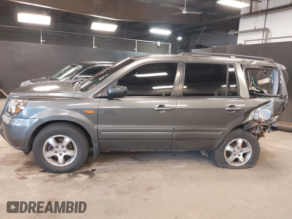 2007 Honda Pilot EX-L z VIN 2HKYF18687H533288, wystawiony jako IAAI lot #42046152 z przebiegiem 165 953 mil mil oraz . Historia ofert i sprzedaży dostępna na DreamBid. Obrazek 14.