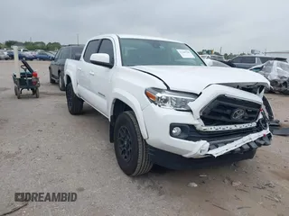 2022 Toyota Tacoma SR5 z VIN 3TMAZ5CN2NM179189, wystawiony jako IAAI lot #42309709 z przebiegiem 61 611 mil mil oraz . Historia ofert i sprzedaży dostępna na DreamBid. Obrazek 1.