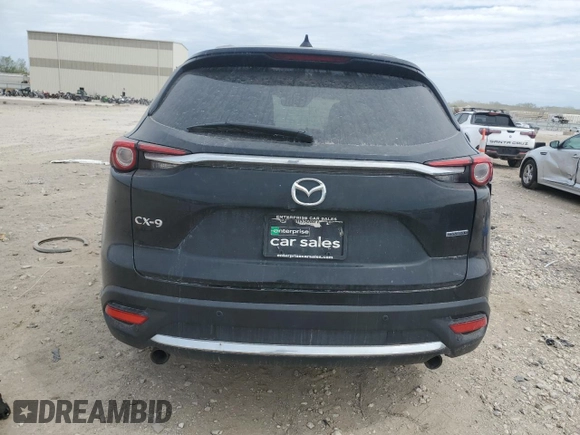 2021 Mazda CX-9 Carbon Edition z VIN JM3TCADY9M0514372, wystawiony jako Copart lot #52902555 z przebiegiem 99 812 mil mil oraz Szkoda całkowita • Salvage title. Historia ofert i sprzedaży dostępna na DreamBid. Obrazek 6.