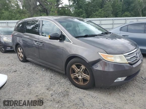 2012 Honda Odyssey Touring with VIN 5FNRL5H94CB102177, listed as a Copart auction lot 55942185 with 179,418 mi miles and Salvage Title. Bid and sale history available at DreamBid. Image 4.