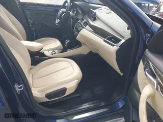 2018 BMW X1 sDrive28i with VIN WBXHU7C34J5H44572, listed as a IAAI auction lot 41607151 with 43,056 mi miles. Bid and sale history available at carsss.com. Image 5.