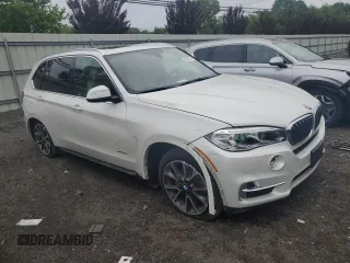 2017 BMW X5 xDrive35i with VIN 5UXKR0C56H0V68771, listed as a Copart auction lot 59587015 with 164,990 mi miles and Salvage title. Bid and sale history available at DreamBid. Image 4.