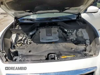 2014 Infiniti QX70 z VIN JN8CS1MU7EM450565, wystawiony jako Copart lot #55931325 z przebiegiem 159 813 mil mil oraz Szkody całkowita. Historia ofert i sprzedaży dostępna na DreamBid. Obrazek 12.