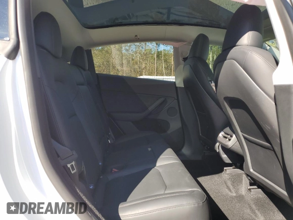 2025 Tesla Model Y Long Range with VIN 7SAYGDED3SA339079, listed as a Copart auction lot 82041424 with 1,793 mi miles and Salvage Title. Bid and sale history available at DreamBid. Image 11.