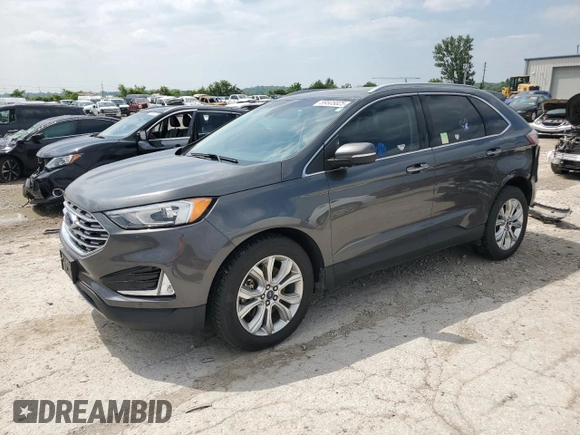 2020 Ford Edge Titanium с VIN 2FMPK4K97LBA11619, выставлен на аукционе Copart как лот 59505825 с пробегом 87 506 миль миль и Списание • Salvage title. История ставок и продаж доступна на DreamBid. Изображение 1.