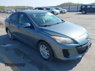 2012 Mazda 3 i Touring z VIN JM1BL1V73C1695634, wystawiony jako IAAI lot #42223477 z przebiegiem 138 302 mil mil oraz . Historia ofert i sprzedaży dostępna na DreamBid. Obrazek 1.
