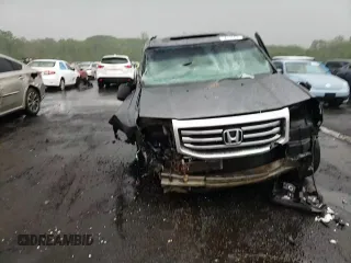 2013 Honda Pilot EX-L z VIN 5FNYF4H53DB072245, wystawiony jako Copart lot #56153435 z przebiegiem Nie podano mil oraz Szkoda całkowita • Salvage title. Historia ofert i sprzedaży dostępna na DreamBid. Obrazek 14.