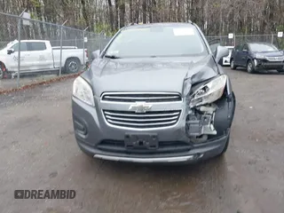 2015 Chevrolet Trax LT with VIN KL7CJRSBXFB097960, listed as a IAAI auction lot 41976883 with 98,621 mi miles and . Bid and sale history available at carsss.com. Image 12.