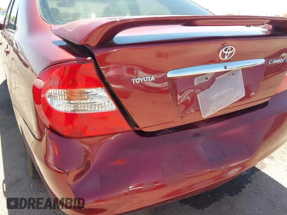 2002 Toyota Camry LE z VIN 4T1BE32K52U082454, wystawiony jako IAAI lot #42276881 z przebiegiem 225 814 mil mil oraz . Historia ofert i sprzedaży dostępna na DreamBid. Obrazek 6.