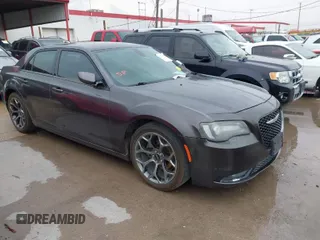 2015 Chrysler 300 with VIN 2C3CCABG7FH756311, listed as a IAAI auction lot 41814189 with 217,410 mi miles. Bid and sale history available at carsss.com. Image 1.