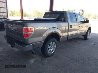 2011 Ford F-150 XL with VIN 1FTFW1EFXBKD24723, listed as a IAAI auction lot 42125305 with 202,032 mi miles. Bid and sale history available at carsss.com. Image 4.