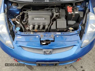 2007 Honda Fit with VIN JHMGD38497S020207, listed as a Copart auction lot 57447875 with 185,603 mi miles and Salvage title. Bid and sale history available at DreamBid. Image 11.