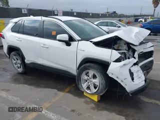 2019 Toyota RAV4 Hybrid LE with VIN 2T3MWRFV3KW013153, listed as a IAAI auction lot 42595171 with Not provided miles and . Bid and sale history available at DreamBid. Image 1.