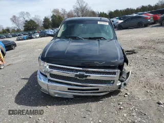 2013 Chevrolet Silverado 1500 LT with VIN 1GCRCSE0XDZ284645, listed as a Copart auction lot 50033945 with 138,053 mi miles and Salvage Title. Bid and sale history available at DreamBid. Image 5.