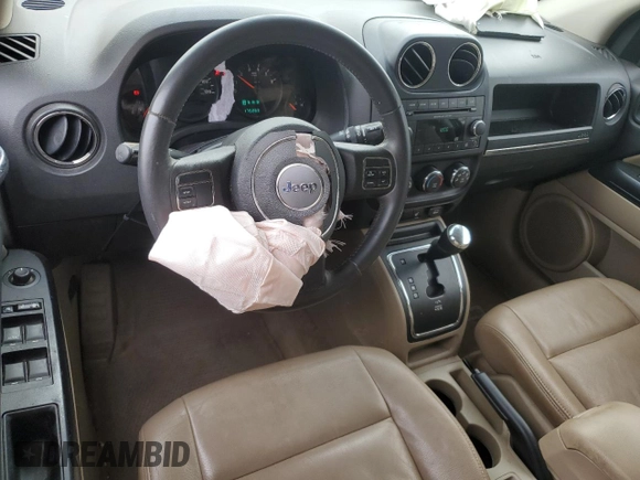 2012 Jeep Compass Latitude with VIN 1C4NJCEA2CD666392, listed as a Copart auction lot 77044444 with 175,283 mi miles and Salvage Title. Bid and sale history available at DreamBid. Image 8.