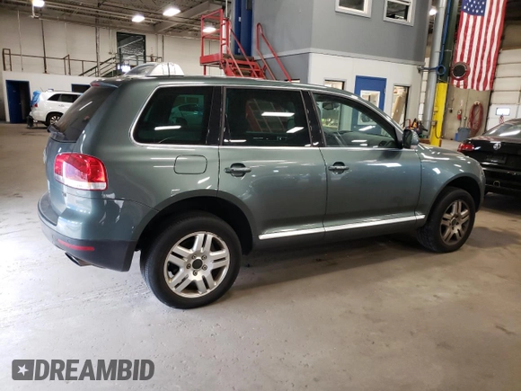 2004 Volkswagen Touareg z VIN WVGCM67L94D032492, wystawiony jako Copart lot #72205044 z przebiegiem 98 482 mil mil oraz Czysty tytuł • Clean title. Historia ofert i sprzedaży dostępna na DreamBid. Obrazek 3.
