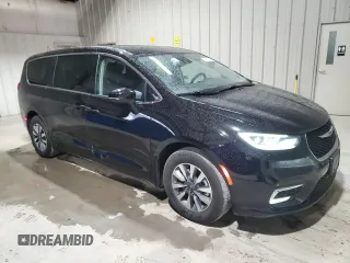 2024 Chrysler Pacifica Hybrid Select z VIN 2C4RC1S7XRR166687, wystawiony jako Copart lot #52501305 z przebiegiem 35 781 mil mil oraz Czysty tytuł • Clean title. Historia ofert i sprzedaży dostępna na DreamBid. Obrazek 4.