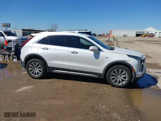 2020 Cadillac XT4 FWD Premium Luxury with VIN 1GYFZCR45LF138622, listed as a IAAI auction lot 41764535 with 99,079 mi miles. Bid and sale history available at carsss.com. Image 13.
