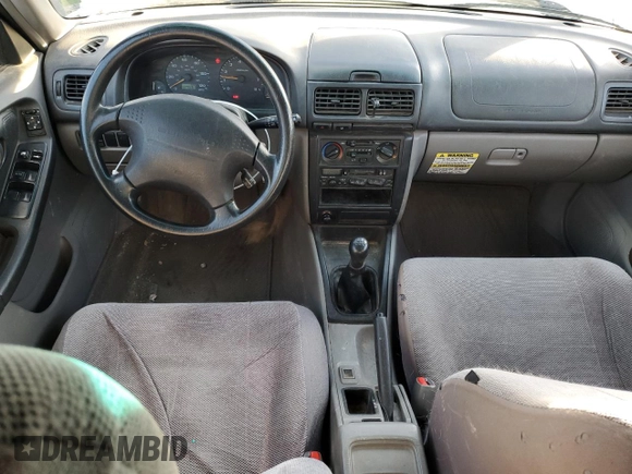 1999 Subaru Forester L with VIN JF1SF6355XG739180, listed as a Copart auction lot 84467674 with 127,591 mi miles and Salvage Title. Bid and sale history available at carsss.com. Image 8.