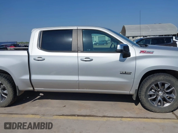 2020 Chevrolet Silverado 1500 LT with VIN 1GCUYDED4LZ240844, listed as a IAAI auction lot 41864044 with 128,665 mi miles and . Bid and sale history available at DreamBid. Image 14.
