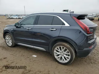 2022 Cadillac XT4 AWD Premium Luxury with VIN 1GYFZDR42NF147920, listed as a Copart auction lot 84058554 with 12,145 mi miles and Salvage Title. Bid and sale history available at carsss.com. Image 2.