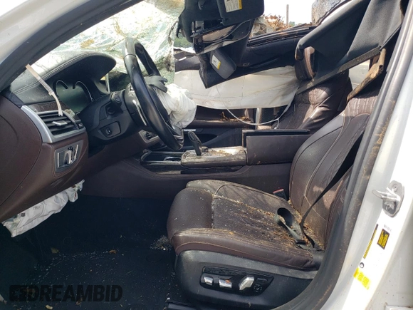 2018 BMW 7 Series 750i with VIN WBA7F0C55JGM23022, listed as a Copart auction lot 63495573 with 0 mi miles and Salvage Title. Bid and sale history available at carsss.com. Image 7.