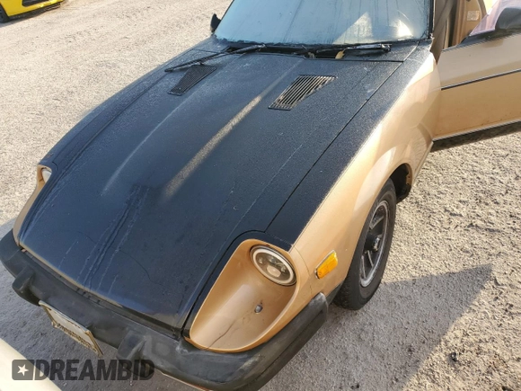 1980 Datsun 280ZX z VIN HS130221335, wystawiony jako Copart lot #76338304 z przebiegiem 135 266 mil mil oraz Szkody całkowita. Historia ofert i sprzedaży dostępna na DreamBid. Obrazek 11.