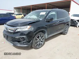 2020 Honda Pilot Touring 8-Passenger with VIN 5FNYF6H91LB003552, listed as a IAAI auction lot 41743685 with 76,725 mi miles and . Bid and sale history available at DreamBid. Image 17.