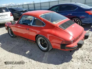1977 Porsche 911 with VIN 9117200797, listed as a Copart auction lot 49103365 with 145,827 mi miles and Salvage title. Bid and sale history available at DreamBid. Image 2.