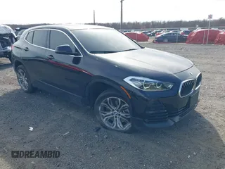 2022 BMW X2 xDrive28i z VIN WBXYJ1C08N5U33290, wystawiony jako IAAI lot #41840157 z przebiegiem 54 809 mil mil oraz . Historia ofert i sprzedaży dostępna na DreamBid. Obrazek 1.