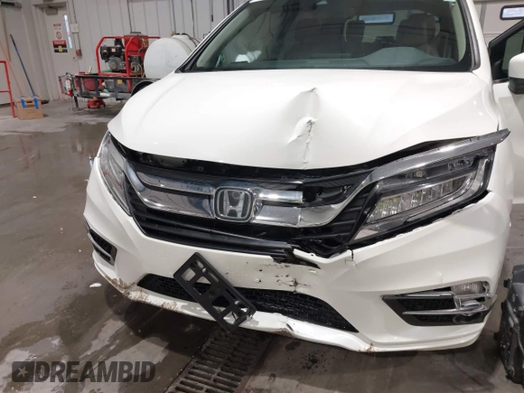2019 Honda Odyssey Touring with VIN 5FNRL6H83KB051363, listed as a IAAI auction lot 41173587 with 88,512 mi miles. Bid and sale history available at carsss.com. Image 6.