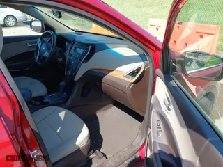 2014 Hyundai Santa Fe Sport with VIN 5XYZT3LB5EG133688, listed as a IAAI auction lot 42077837 with 119,892 mi miles. Bid and sale history available at carsss.com. Image 5.