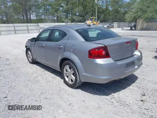 2013 Dodge Avenger SXT with VIN 1C3CDZCGXDN741008, listed as a IAAI auction lot 42086508 with 124,596 mi miles and . Bid and sale history available at carsss.com. Image 3.